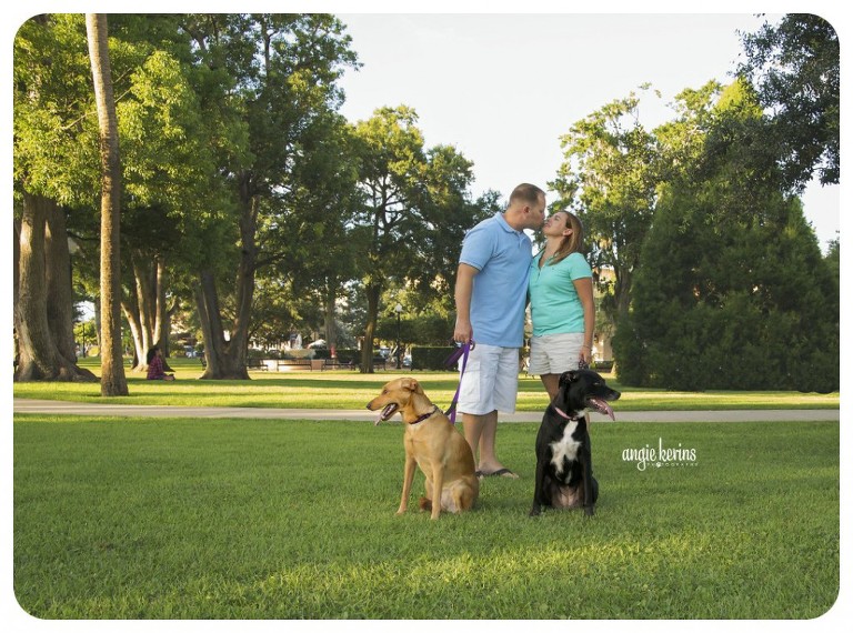 Engagement portrait with 2 dogs at the Farmer's Market in Winter Park Florida